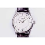 An Oris stainless steel automatic calendar wrist watch the silvered dial with arrow hour markers,