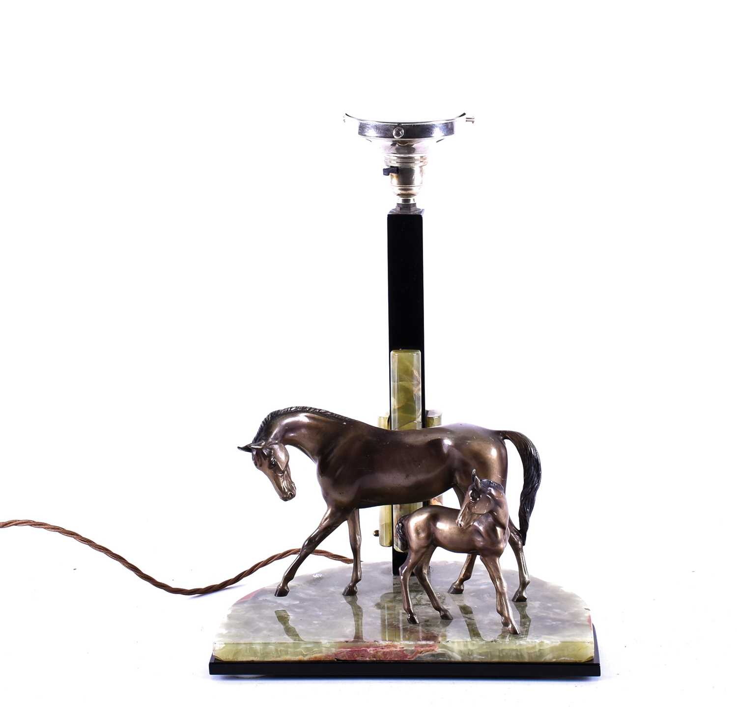 An Art Deco style equestrian-themed table lamp, modelled with a spelter mare and foal on a green