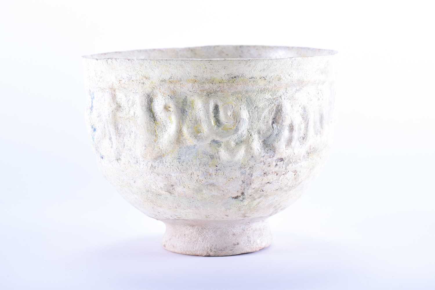 A medieval Islamic pottery bowl with moulded calligraphy,11th - 15th century, with a band of - Image 5 of 5