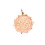A George V half-sovereign, 1911, bare head l. R. St. George and dragon, in a 9ct gold pendant mount,