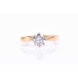 An 18ct yellow gold and solitaire diamond ring, set with a round brilliant-cut stone of