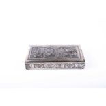 A silvered Persian box, late 19th century, the hinged cover embossed with birds and flowers, the