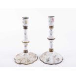 A pair of 18th century Bilston enamel candlesticks, with gilt metal mounts, decorated throughout