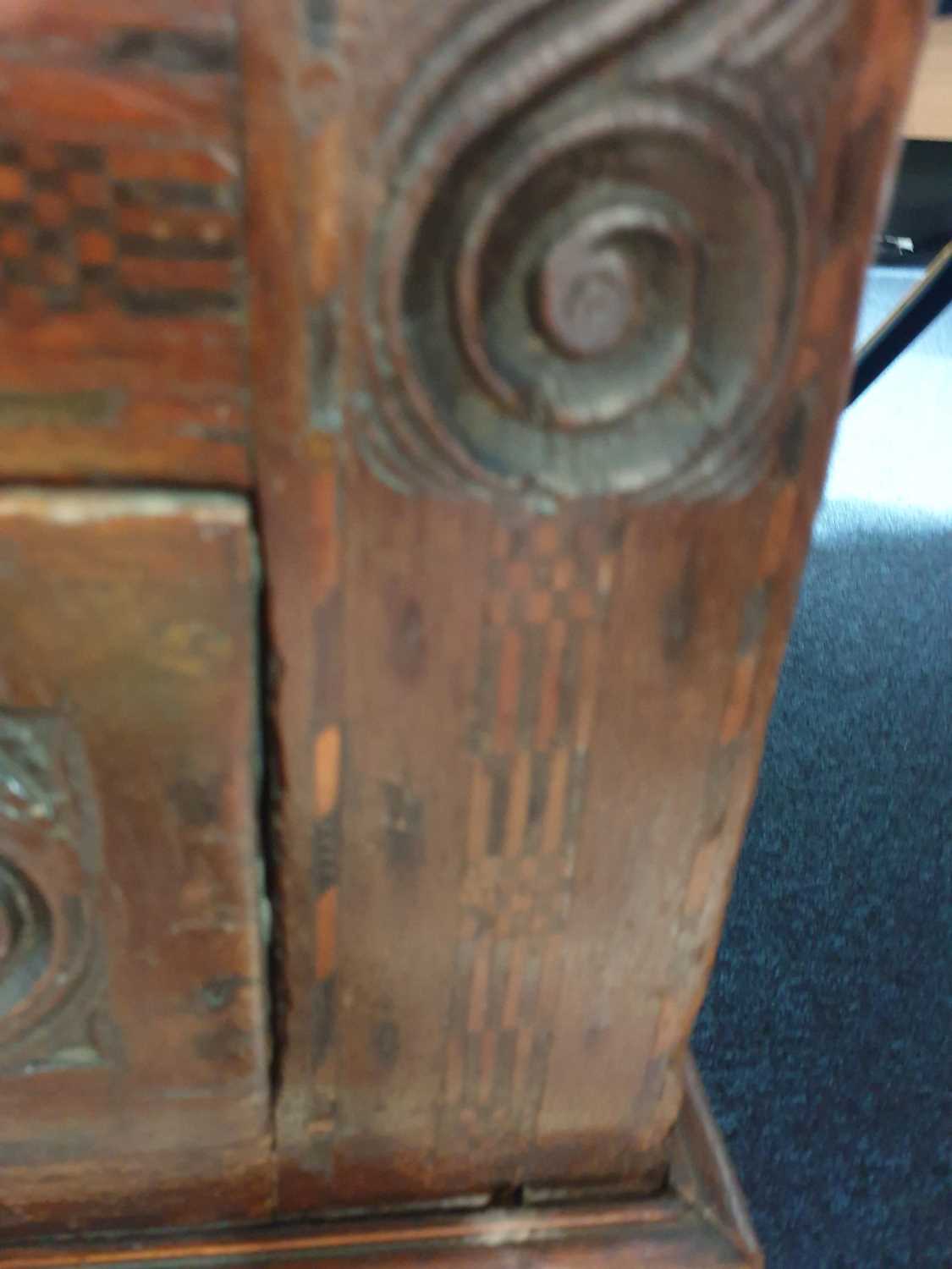 An 18th-century oak linen chest/coffer, the front with marquetry inlay and carved decoration with - Image 23 of 29