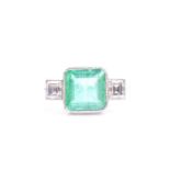 A diamond and emerald ring, set with a mixed square-cut emerald of approximately 2.42 carats,