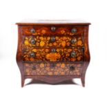 An 18th century Dutch marquetry bombe commode, the top, front and sides profusely inlaid with