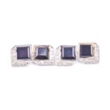 A pair of diamond and black onyx cufflinks, late Art Deco, of stylised square form, set with a