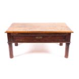 An oak antique style coffee table, the rectangular top with moulded edge above a full length drawer,