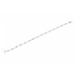A 14ct yellow gold and diamond line bracelet, set with approximately 0.92 carats of round and