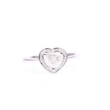 An 18ct white gold and diamond heart-shaped ring, set with a heart-shaped diamond of approximately