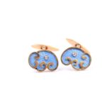 A pair of Russian gold, diamond and enamel cufflinks, the palette shaped plaques centred with an old
