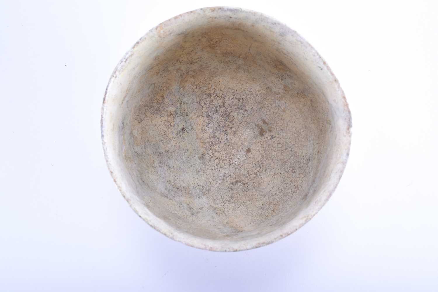 A medieval Islamic pottery bowl with moulded calligraphy,11th - 15th century, with a band of - Image 4 of 5