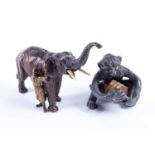 Franz Bergman, a miniature cold painted bronze elephant and handler, impressed vase mark to one