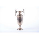 An Eastern Islamic silver vase, Persian, 19th Century, of baluster form, the flared rim with two