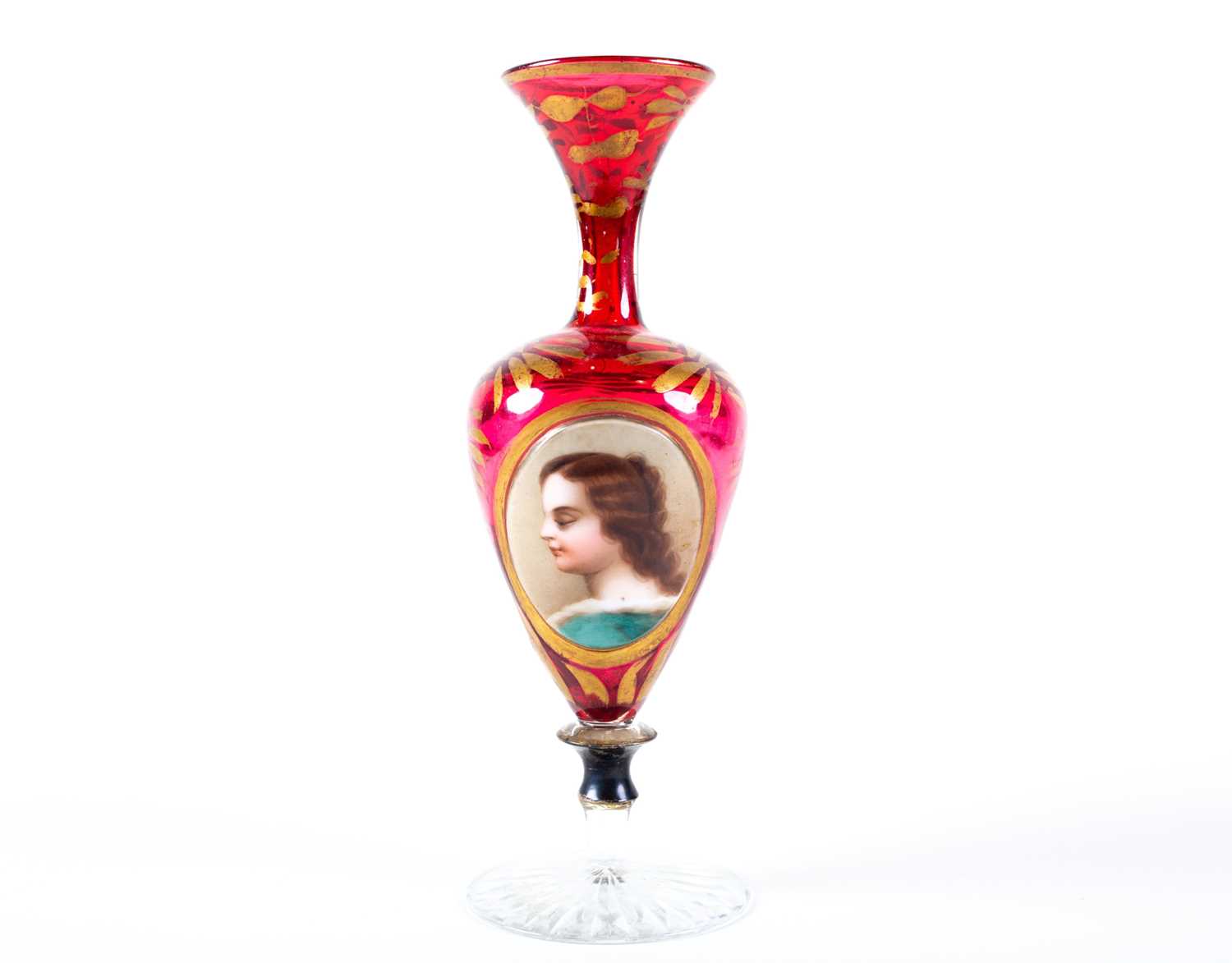 A 19th century Bohemian ruby and clear glass pedestal spill vase, with a hand painted portrait to