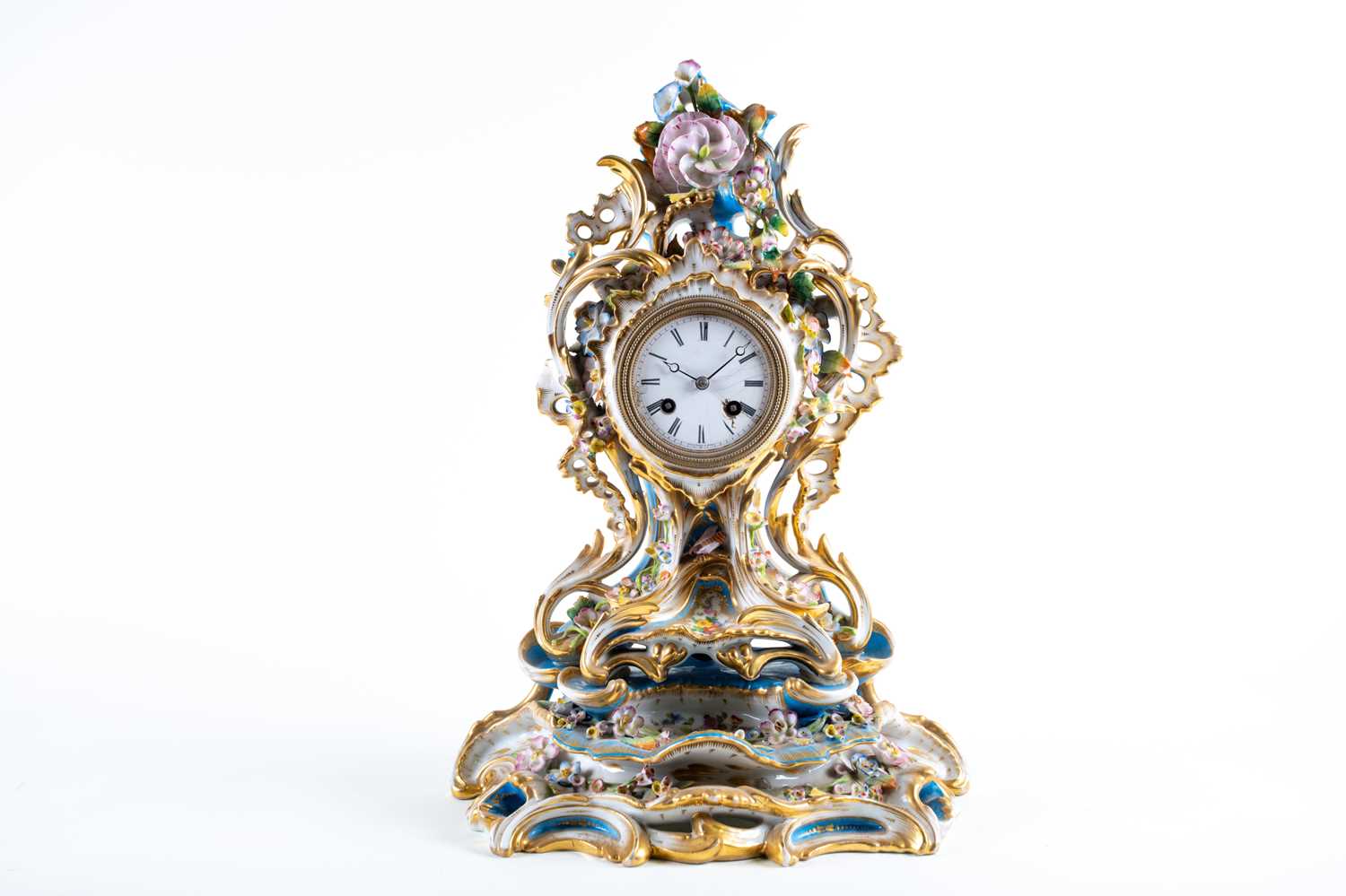 A 19th-century French porcelain chiming mantle clock on conforming stand, in the Sevres style with