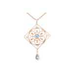 A late 19th / early 20th century Art Nouveau yellow gold and aquamarine set pendant, of square