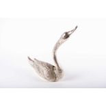 A table centrepiece in the form of a swan, the articulated wings opening to reveal a pull out vessel