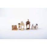 Three Japanese ivory okimono and a netsuke, Meiji/Taisho, comprising a fortune teller reading a