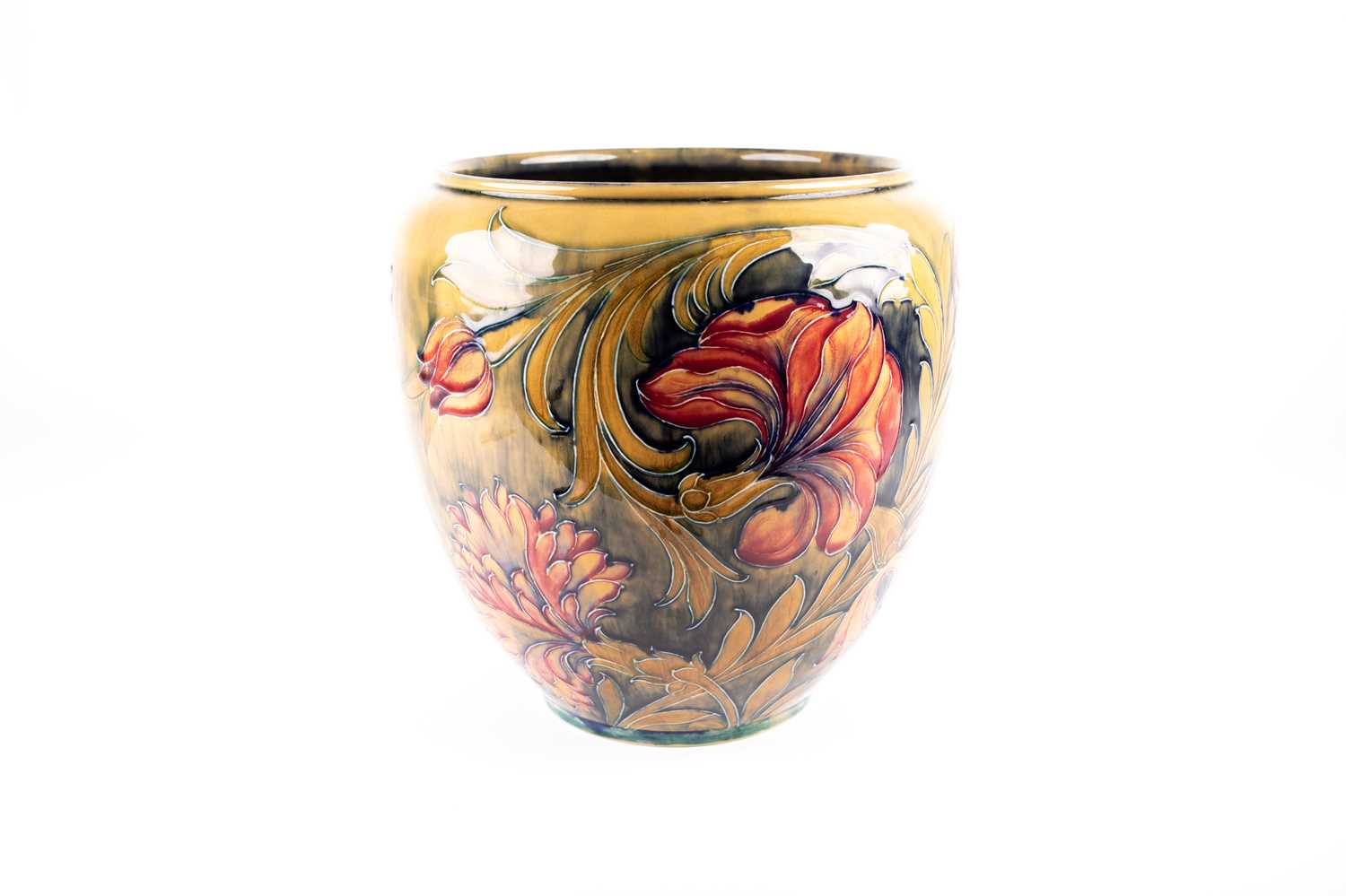 A William Moorcroft 'Spanish' pattern jardiniere, circa 1910, of ovoid shouldered form, green