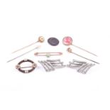 A small group of antique jewellery, to include a yellow metal and plaited hair brooch with pearl and