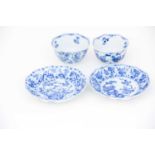 A near pair of Chinese blue & white petal moulded tea bowls and matched saucers, Kangxi (1662 -
