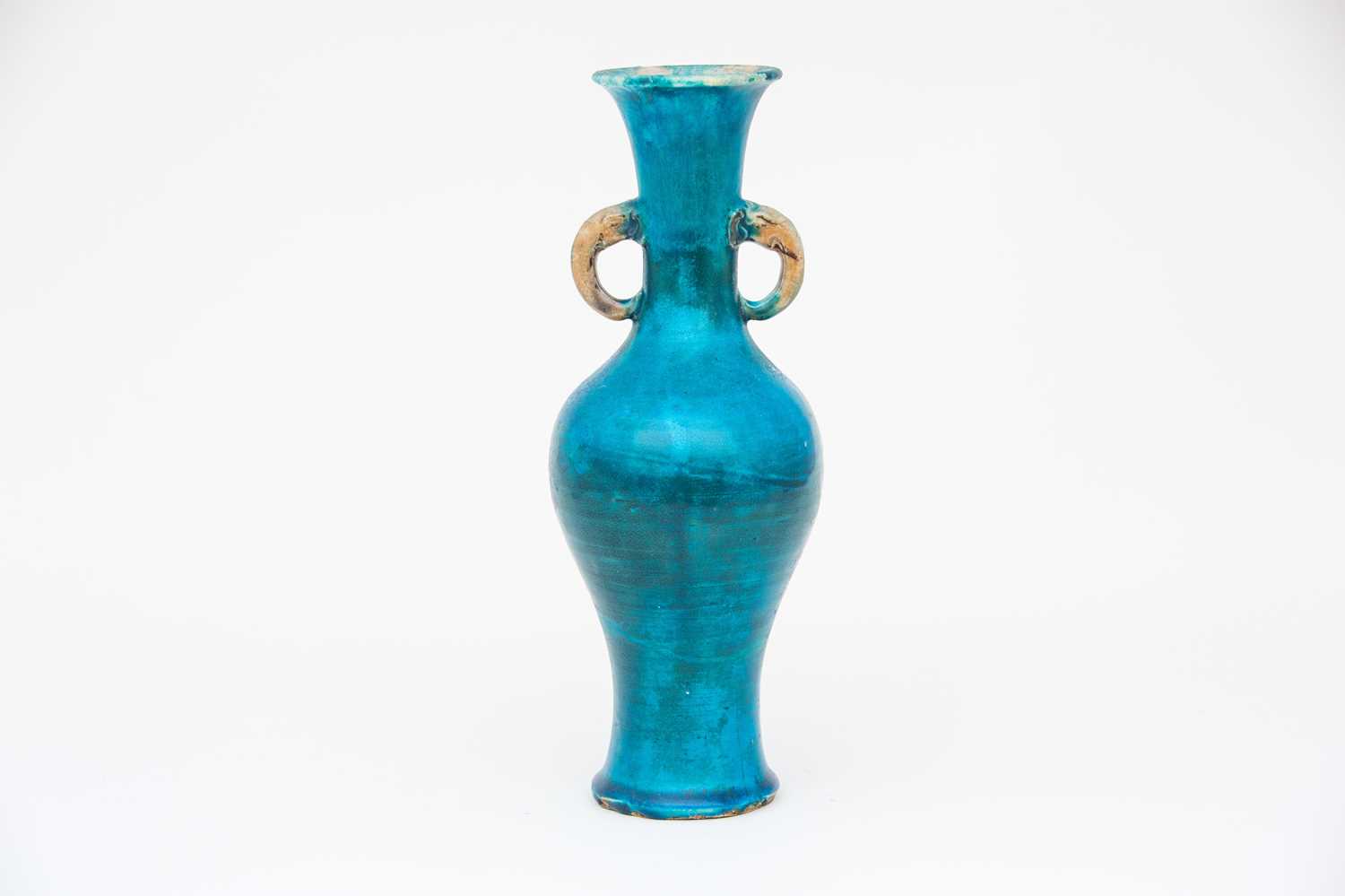 A Chinese porcelain turquoise glaze vase, 中国，青蓝釉双耳瓷瓶一件，可以明代 possibly Ming dynasty, with buff