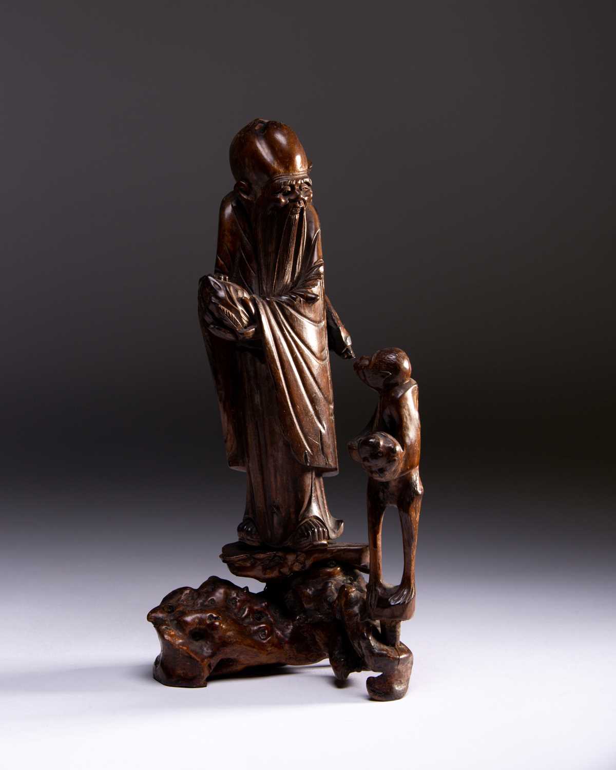 A Chinese carved wood figure of Shoulao and a Monkey, Qing, 中国, 寿老与猴木雕像一件，清代，18世纪 18th century,
