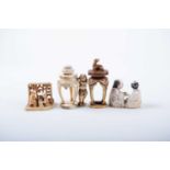 Three Japanese ivory okimono and a netsuke, Meiji/Taisho, comprising a fortune teller reading a