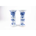 A pair of Chinese blue & white Gu form vases, 19th century, 中国，青花觚式花瓶一对，19世纪 the flaring rims