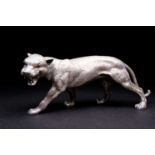 A large Spanish silver leopard, mid 20th century, modelled prowling with a snarling face, the tail