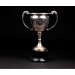 A George V large silver trophy, Birmingham 1932 by Davies & Powers, mounted to an ebonised base,