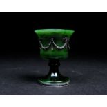 A Faberge nephrite jade cup, 20th century, the bell shape bowl with applied silver swags tied with