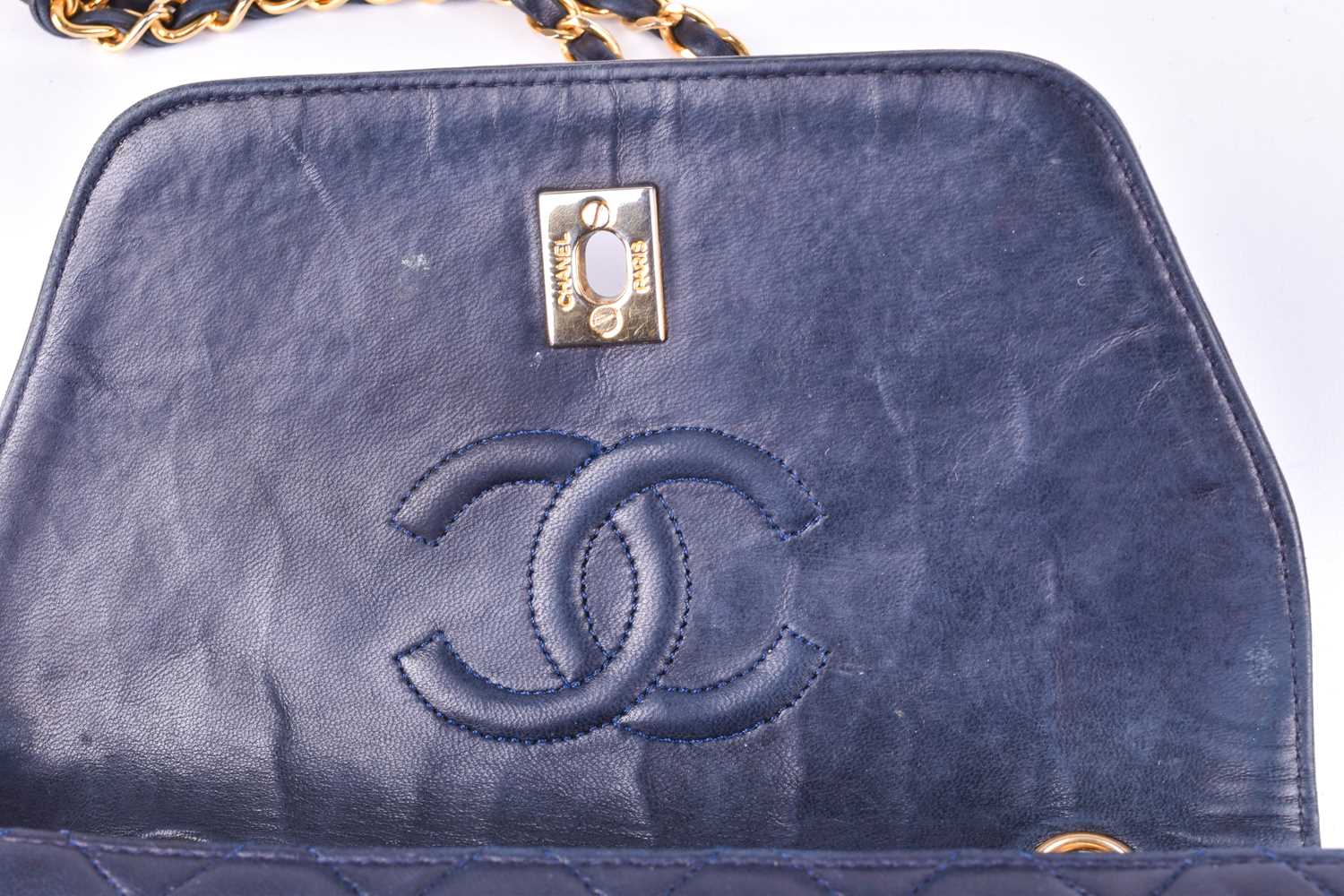 Chanel. A classic quilted leather handbag, of tapered square design, with gold tone CC logo clasp, - Image 4 of 13