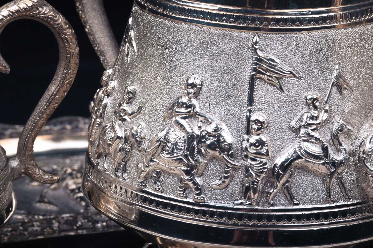 An Indian white metal three-piece teaset and conforming oval tray, 20th century, each decorated with - Image 5 of 5