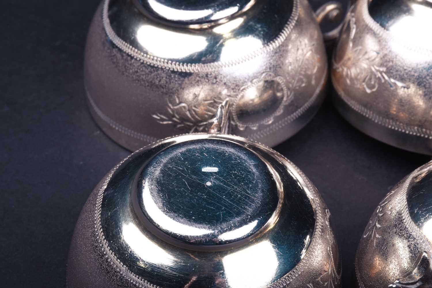 A set of twelve Syrian silver dowry cups and saucers, marked 'Silver' to the bases, together with - Image 2 of 8