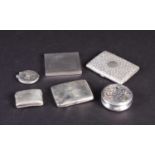 A collection of small silver items, comprising an aide-memoire, two cigarette cases, two vestas