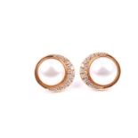 A pair of 18ct gold, diamond and mabe pearl earrings; with two rows of crescent shaped round