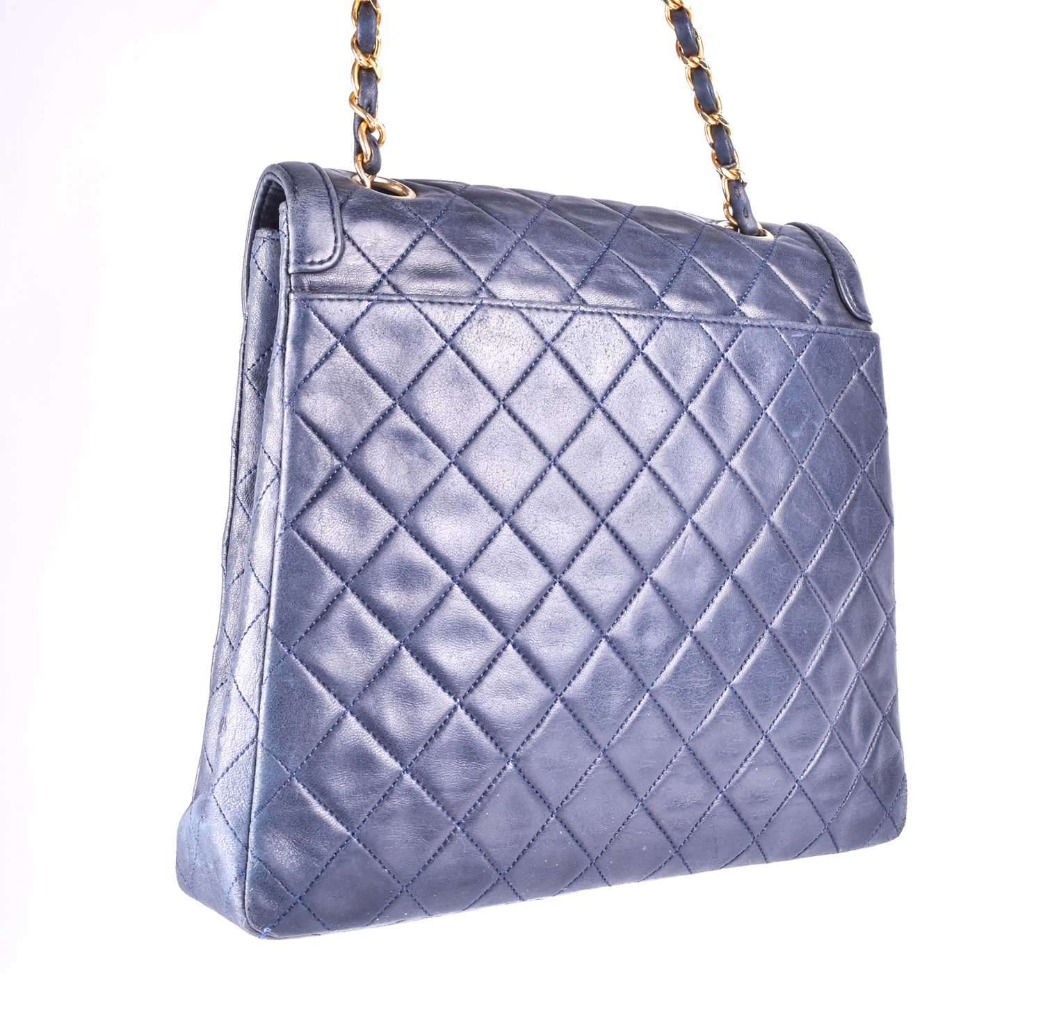 Chanel. A classic quilted leather handbag, of tapered square design, with gold tone CC logo clasp, - Image 13 of 13