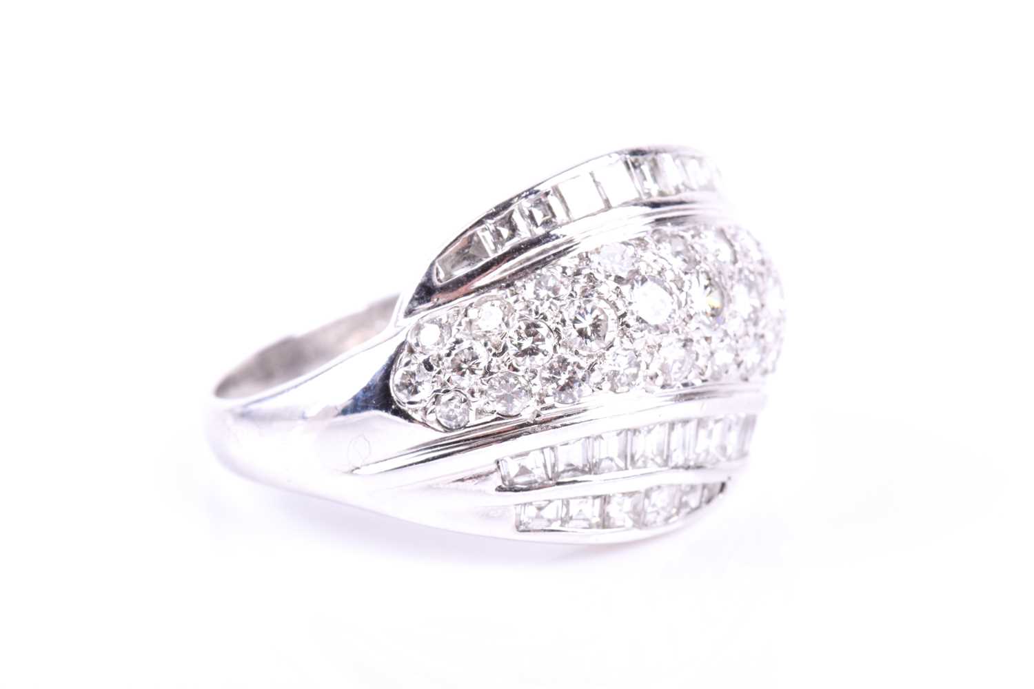 An 18ct white gold and diamond swirled bombe-style ring, pave-set with round brilliant-cut diamonds, - Image 3 of 6