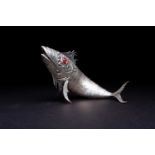 A silver plated articulated fish, 20th century, with red glass eyes, 27cmCondition report: Plate