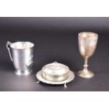 A George VI silver tankard, Birmingham 1941 (maker indistinct), with scroll handle, 11.3 cm high,