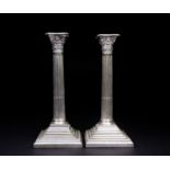 A matched pair of late Victorian silver candlesticks, John Aldwinckle & Thomas Slater, London 1889/