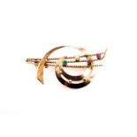 An unusual 14ct yellow gold multi-gem brooch, of stylised swirl and rope-twist design, inset with