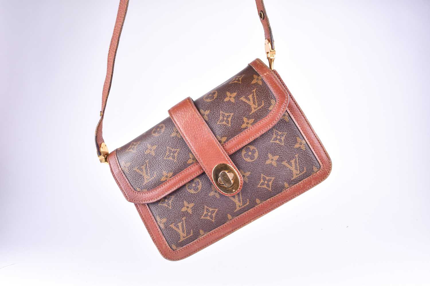 Louis Vuitton. A vintage 1980s monogram leather satchel handbag, with brown leather and monogram