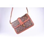 Louis Vuitton. A vintage 1980s monogram leather satchel handbag, with brown leather and monogram