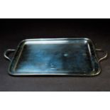 A George V twin handled silver tray, Sheffield 1932 by James Deakin & Sons, of plain rectangular