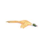 A diamond and enamel pheasant brooch, the realistaically modelled bird depicted in flight; wth