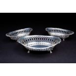 A set of three George V graduated silver baskets, Birmingham 1933 by Britton, Gould & Co, of oval