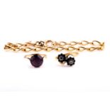 A yellow metal oval twist-link bracelet, together with a yellow metal and purple stone ring (
